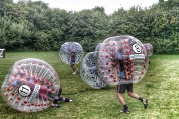 people in essex playing zorb and bubble football