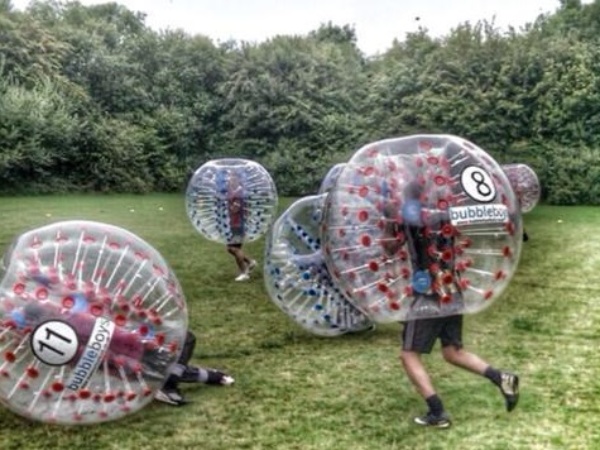 people in essex playing zorb and bubble football